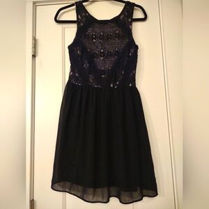 Rewind SZ M Black Laced Top Dress W/cream lining. Great Condition.